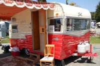 Picture of a restored 1960 Shasta trailer showing the new front profile introduced in model year 1958